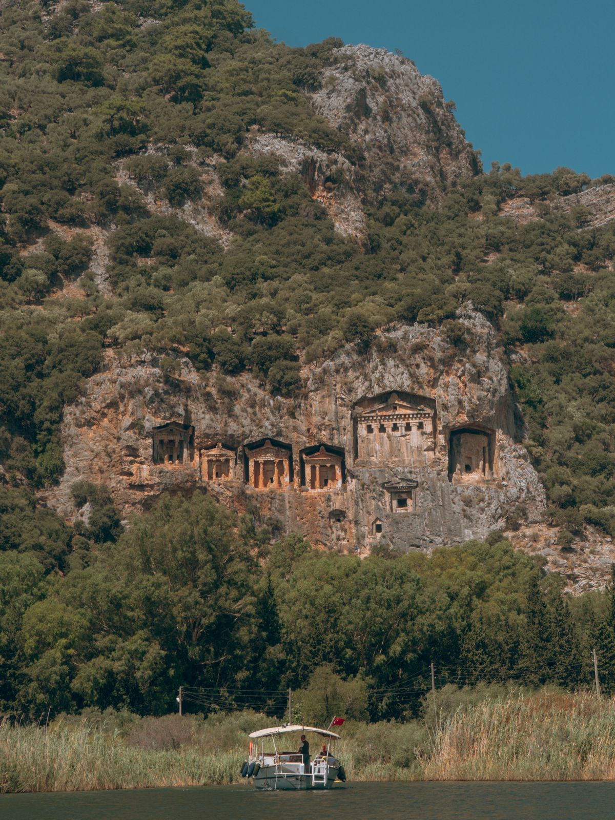 Lycian rock-cut tombs in the cliff above the river at Dalyan